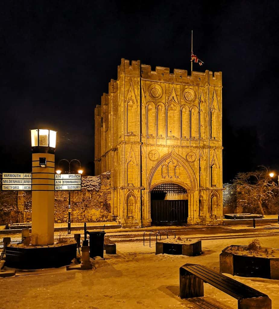 Evening winter photo of Bury St Edmunds majestic mediaeval Great Gate to Abbey Gardens