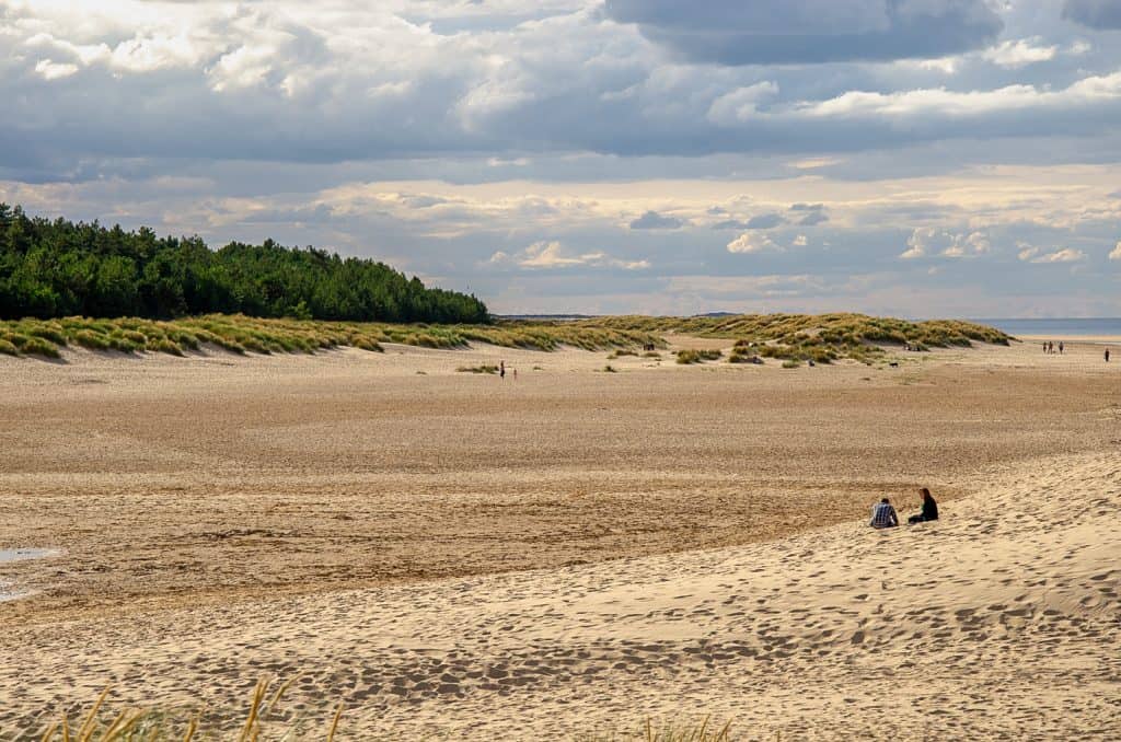Holkham beach and sand dunes when it's cloudy, one of the best beaches in Norfolk.