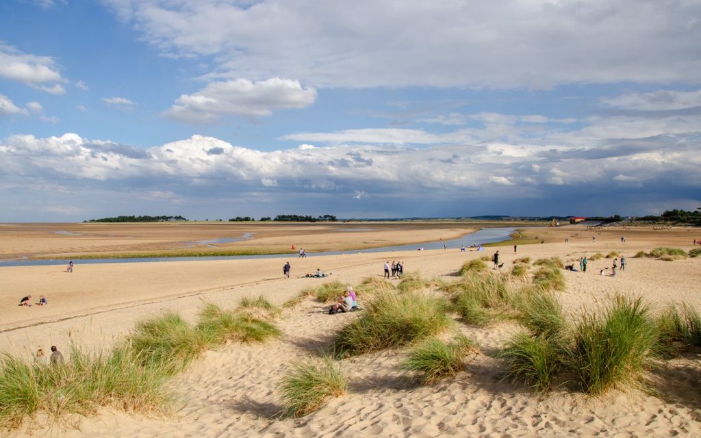 Holkham Beach in the sunshine, one of the best beaches in Norfolk.