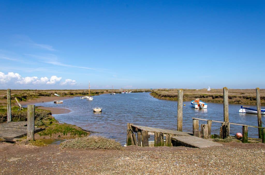 View at the creek with boats at Blakeney Point in North Norfolk.