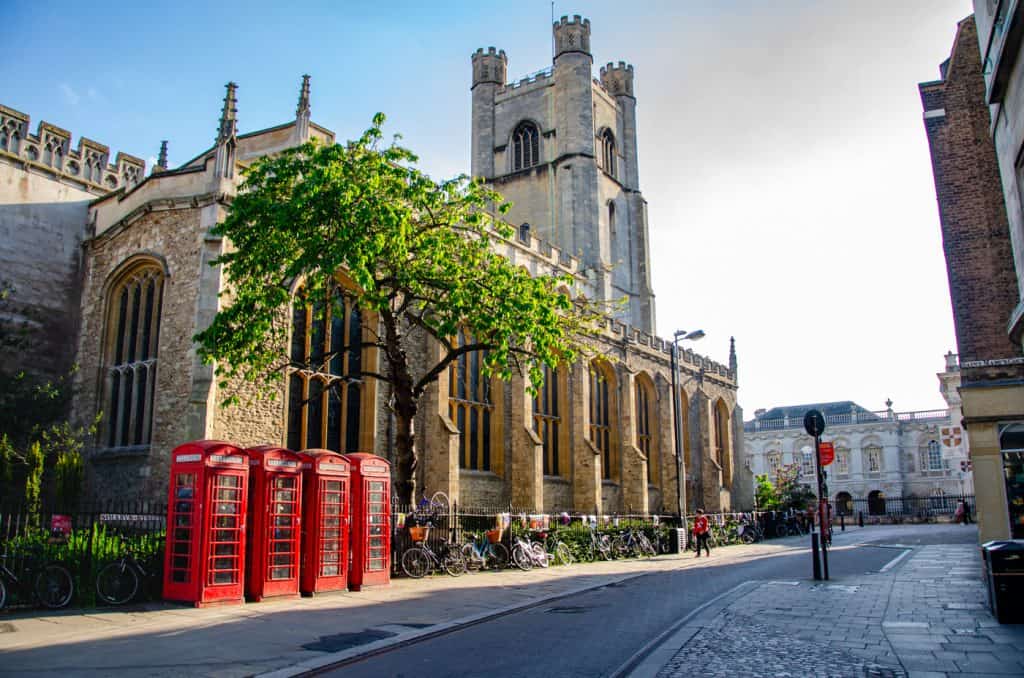View at the St Mary's Church in Cambridge with its famous red telephone boxes.
