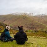 A couple looking at pikes of the Lake District in winter. A perfect Lake District weekend breaks.