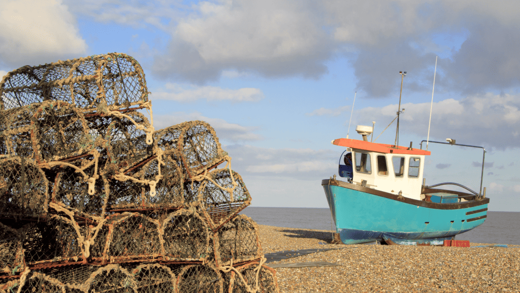 A boat on the Aldeburgh Beach in Suffolk, one of the best beaches in Suffolk.