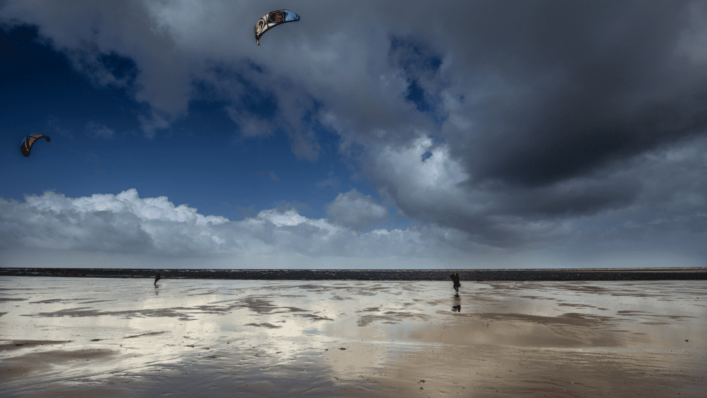 Bancaster Beach with people in North Norfolk.