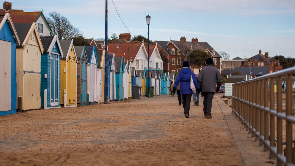 A couple walking on the promenade in Felixstowe.