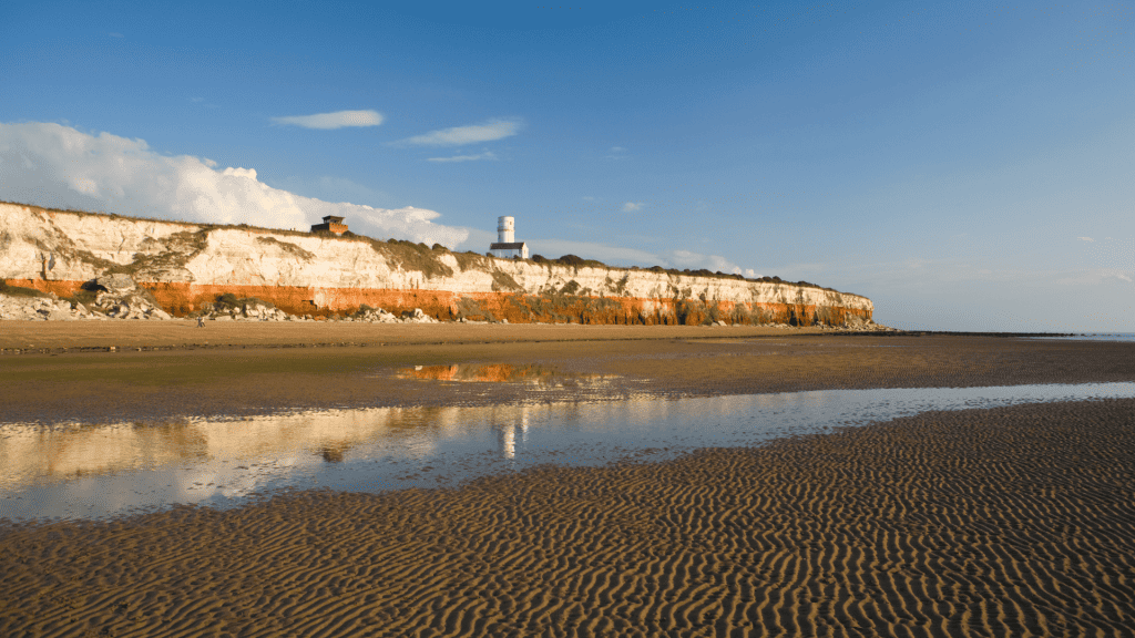 View at the Lighthouse, beach and cliffs in Hunstanton, one of the best seaside towns in East Anglia.