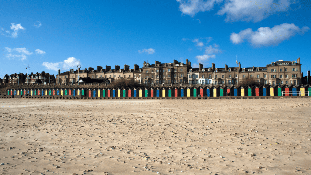 Lowestoft Beach with colourful beach huts.