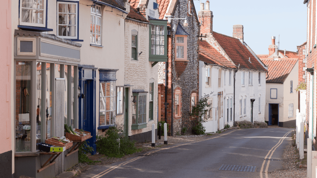 A street with historical houses in Blakeney village in Norfolk Coast AONB.