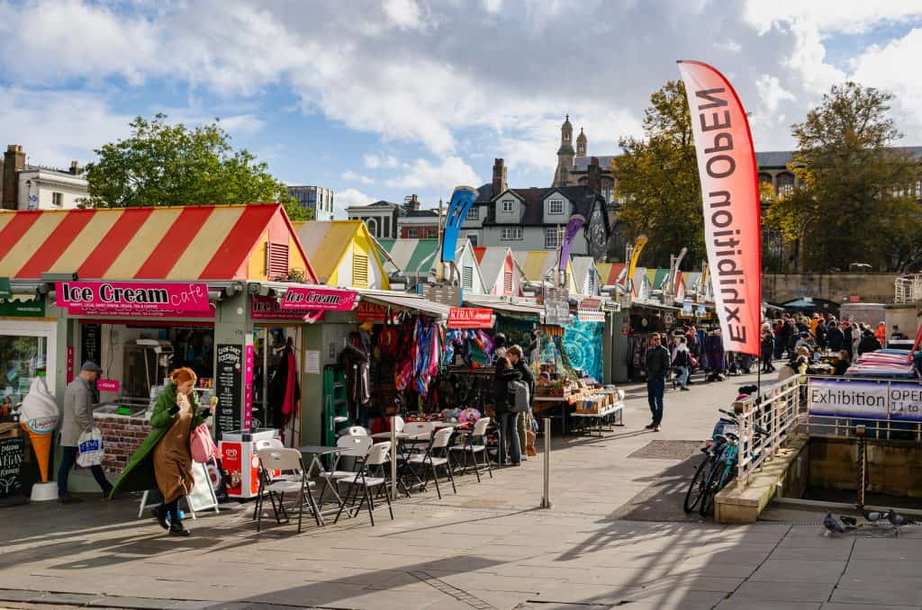 Norwich market during a sunny day,  a place that must be on your day trip to Norwich list.