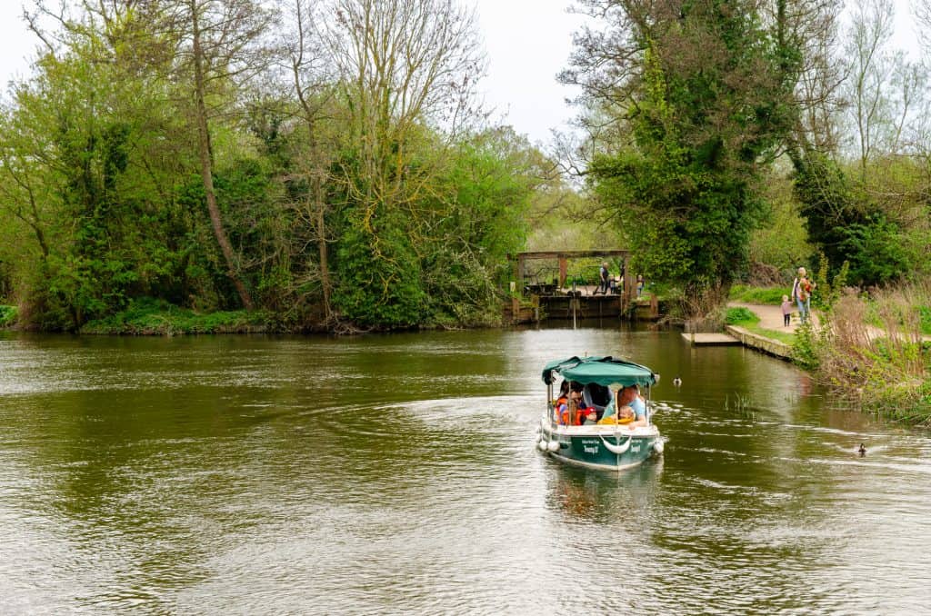 Boat on the river Stour in Flatford Mill in Dedham Vale AONB.