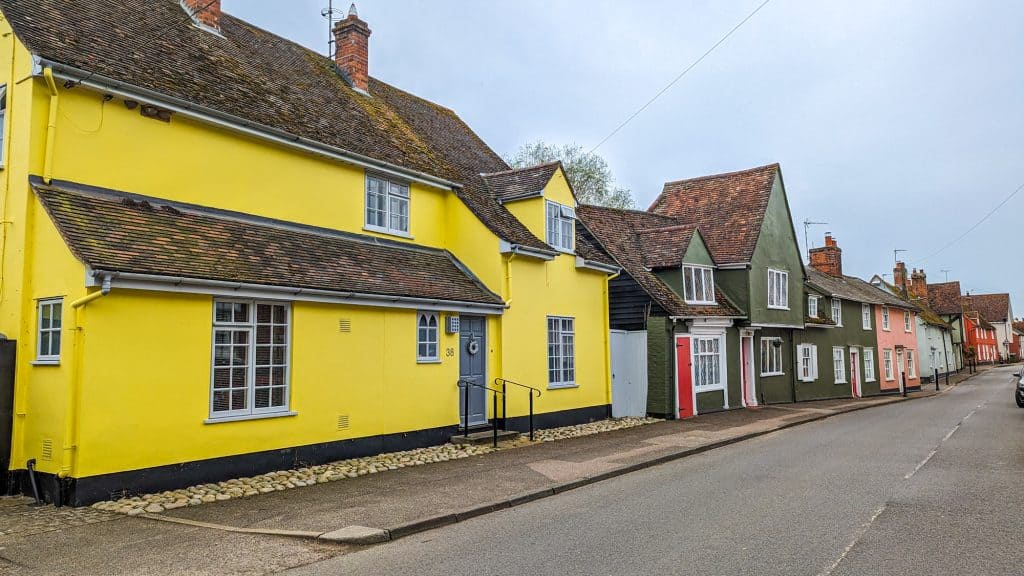 A street with colourful houses in Nayland in Dedham Vale AONB.