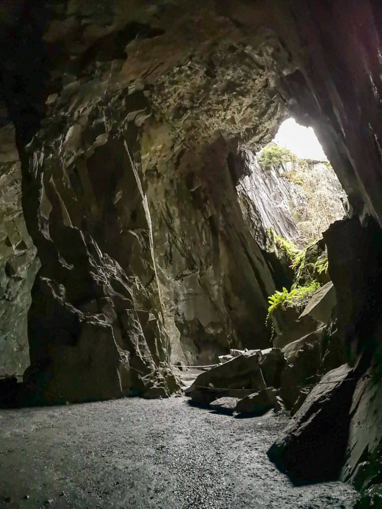 View the main chamber in the Cathedral Cave in the Lake District.