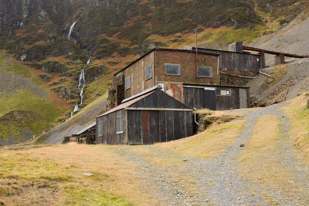 Old mine in Lake District with a waterfall.
