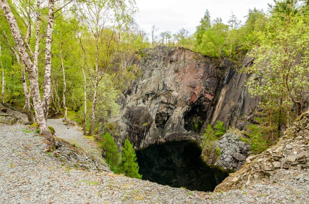 Hodge Quarry from a viewpoint with trees.