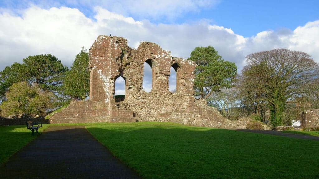 View at the ruins of the Egremont castle and a bench.