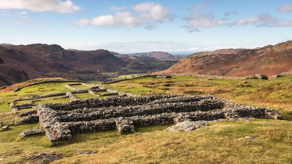 Roman Hardknott Fort in autumn with hills at back.