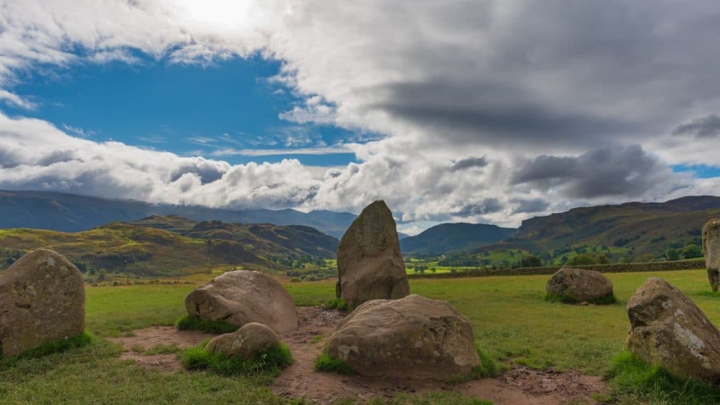 Stone Circle with hills at the back.