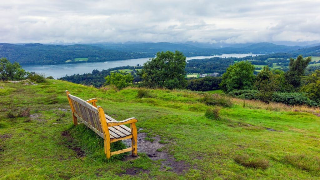 Walks around Windermere - A bench with a view on a lake.