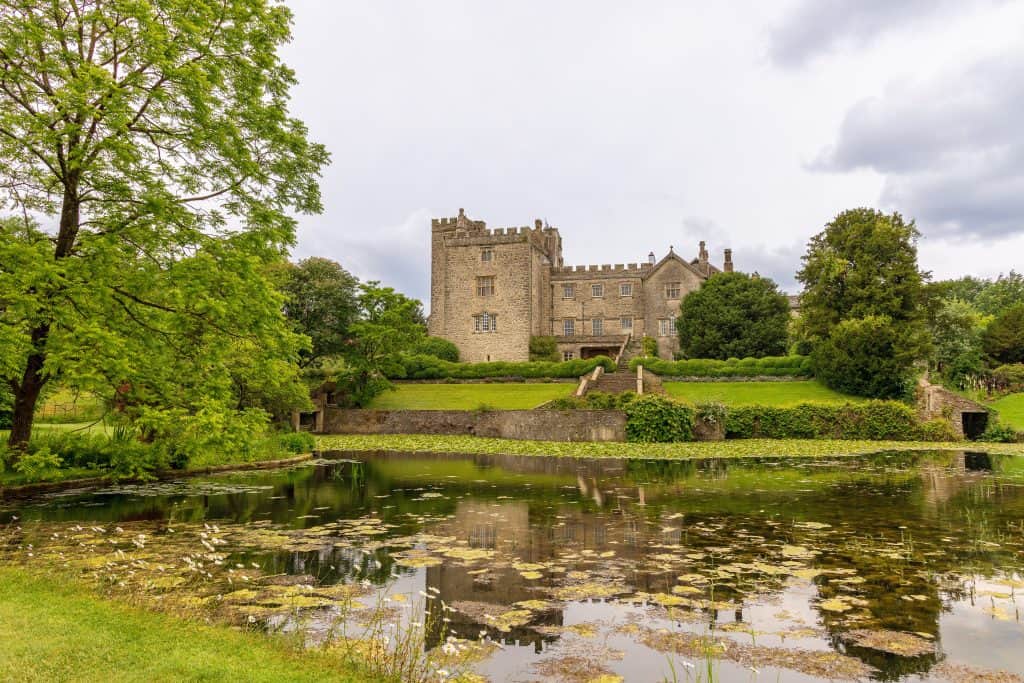 View at the Sizergh Castle with pond and trees.