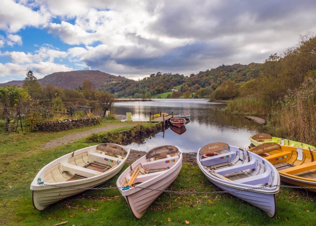 Rowing boats on a lakeshore in autumn.