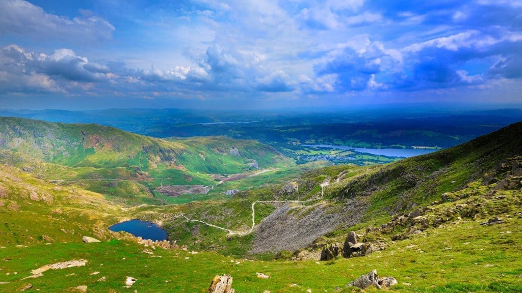 View from hills at a valley with lakes.