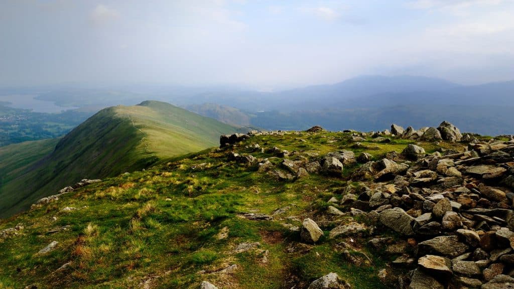 View at a stony summit of a mountain in the Lake District.