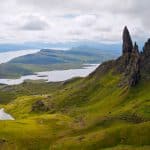 View at the Old Man of Storr on the Isle of Skye, views showing the rock formation of the Storr, landscape and surrounding sea and lakes in summer; one of the best hikes on Isle of Skye.
