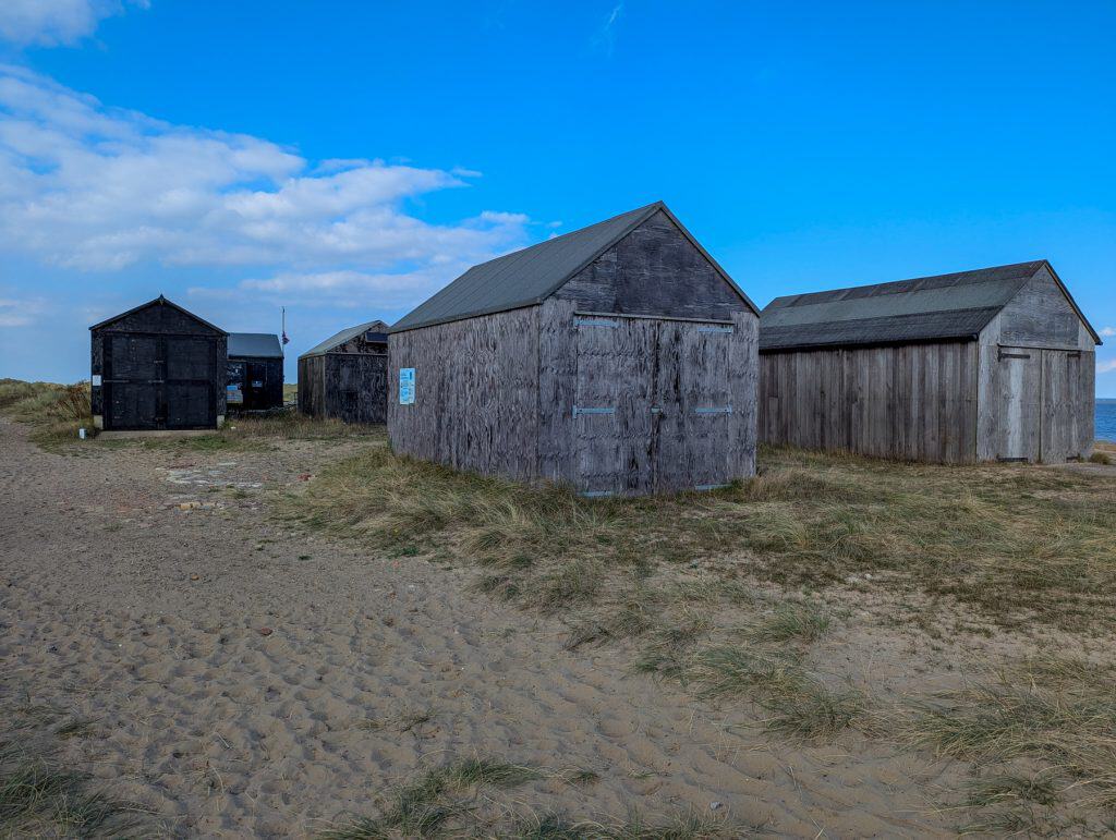 Wooden huts at Winterton Beach.