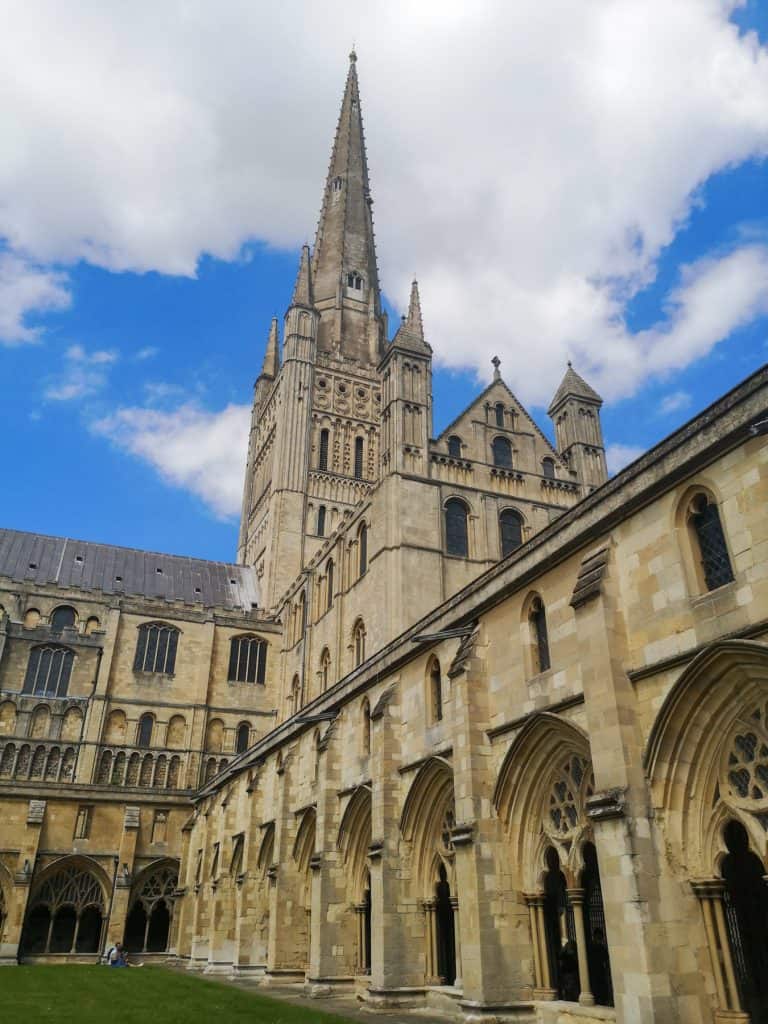 Norwich Cathedral on a sunny day, a place that must be on your day trip to Norwich list.