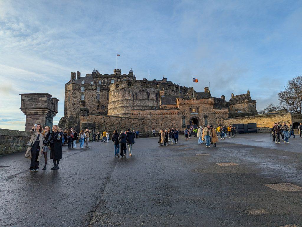 View at the entrance to the Edinburgh Castle with people taking pictures.