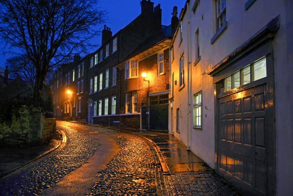 An empty Durham street at night.