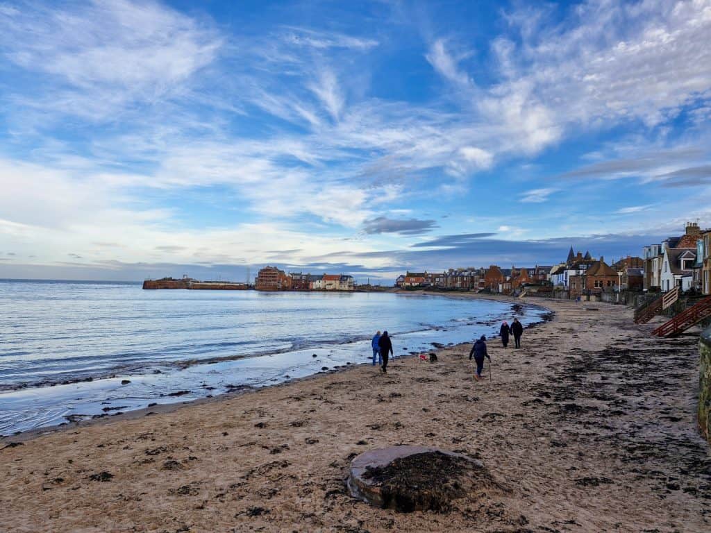 A view at a beach with houses in North Berwick, one of the best things to do in North Berwick.