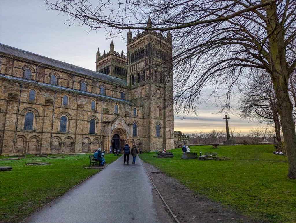 A pavement leading to the Durham Cathedral in winter. Exploring the cathedral is one of the best things to do in Durham for couples.