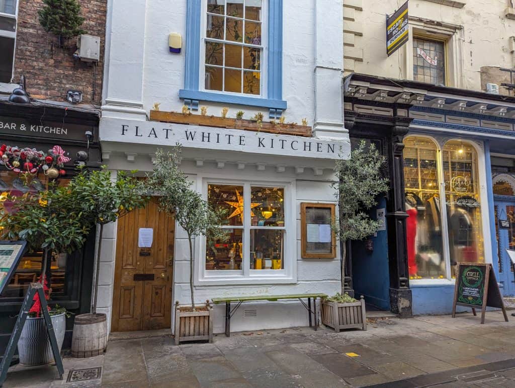 An entrance to the Flat White Kitchen with Christmas decorations.