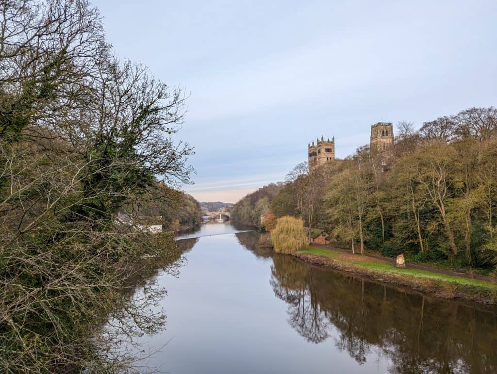 Durham River Walk with views of the river and the Durham Cathedral in winter. The walk is one of the best things to do for free in Durham.