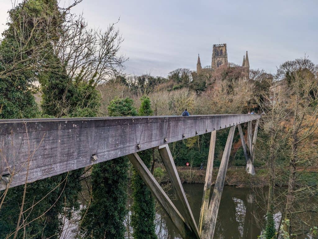 View at the Kingsgate Footbridge in Durham with the Durham Cathedral at the distance. The walk is one of the best things to do for free in Durham.