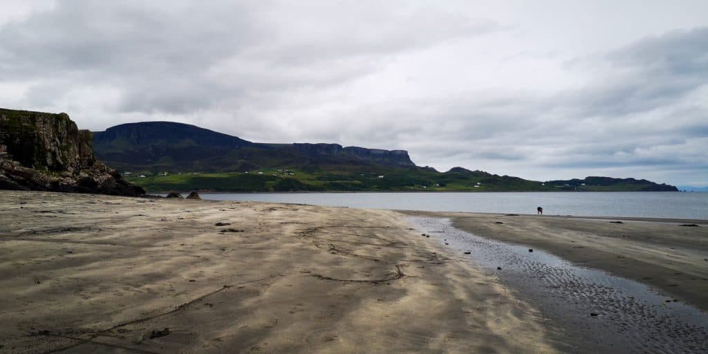 Views from the Ann Coran beach with sea and Quirang rock formation at back.