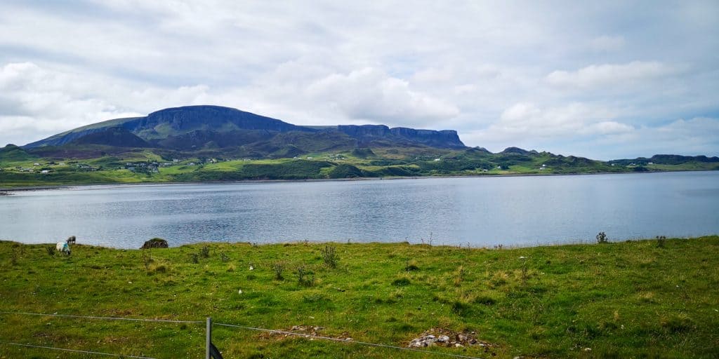 View from the trail leading to the Ann Coran beach with sea views and famous Quirang rock formation at back.