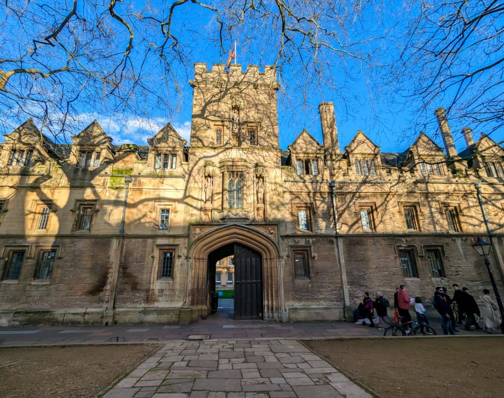 View at the St John's College building entrance on a sunny day. Visiting colleges is a must during a perfect day trip to Oxford.