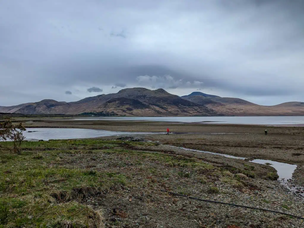 Loch Na Keal - view on the loch with mountains at back on a cloudy day.