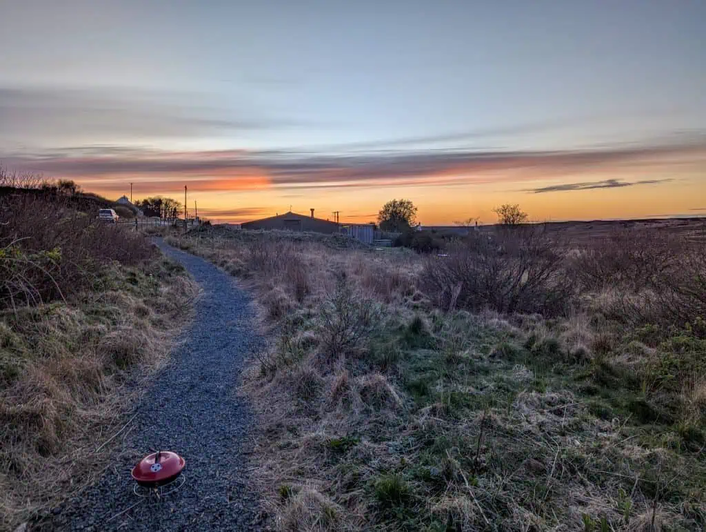 Sunset on the Isle of Mull with path and barbecue.