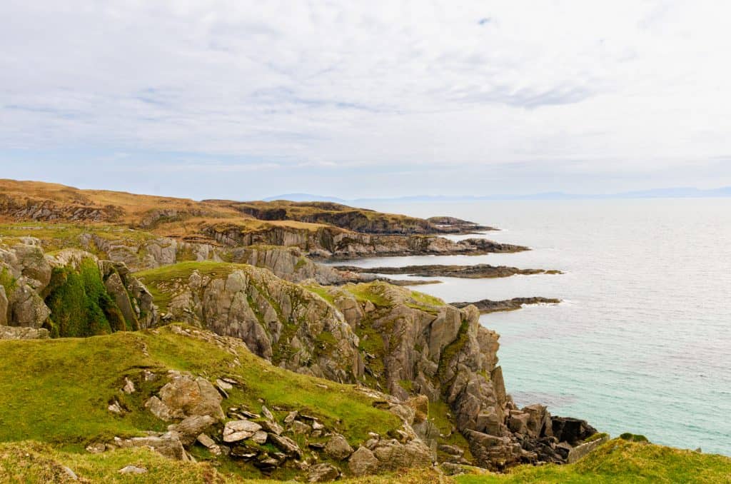 View at the coastline with cliffs and sea on the Ross of Mull on the Isle of Skye.
