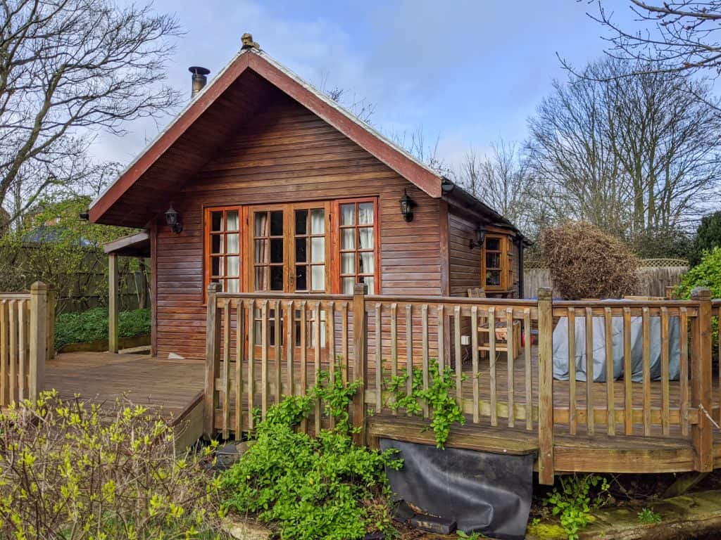 A wooden hut in early spring.