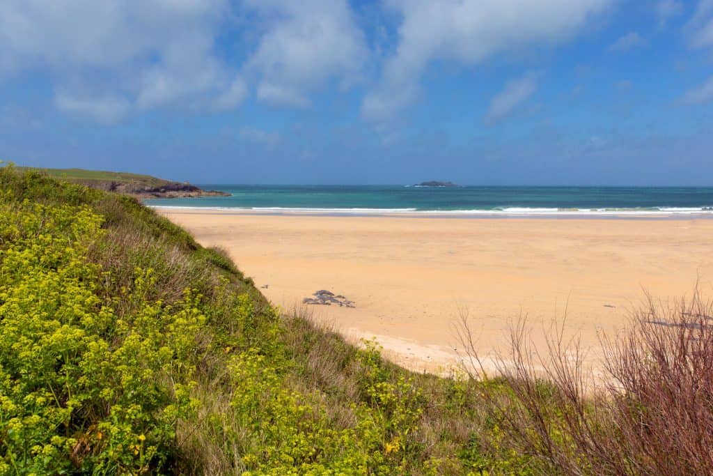 Sandy beach with sea views.