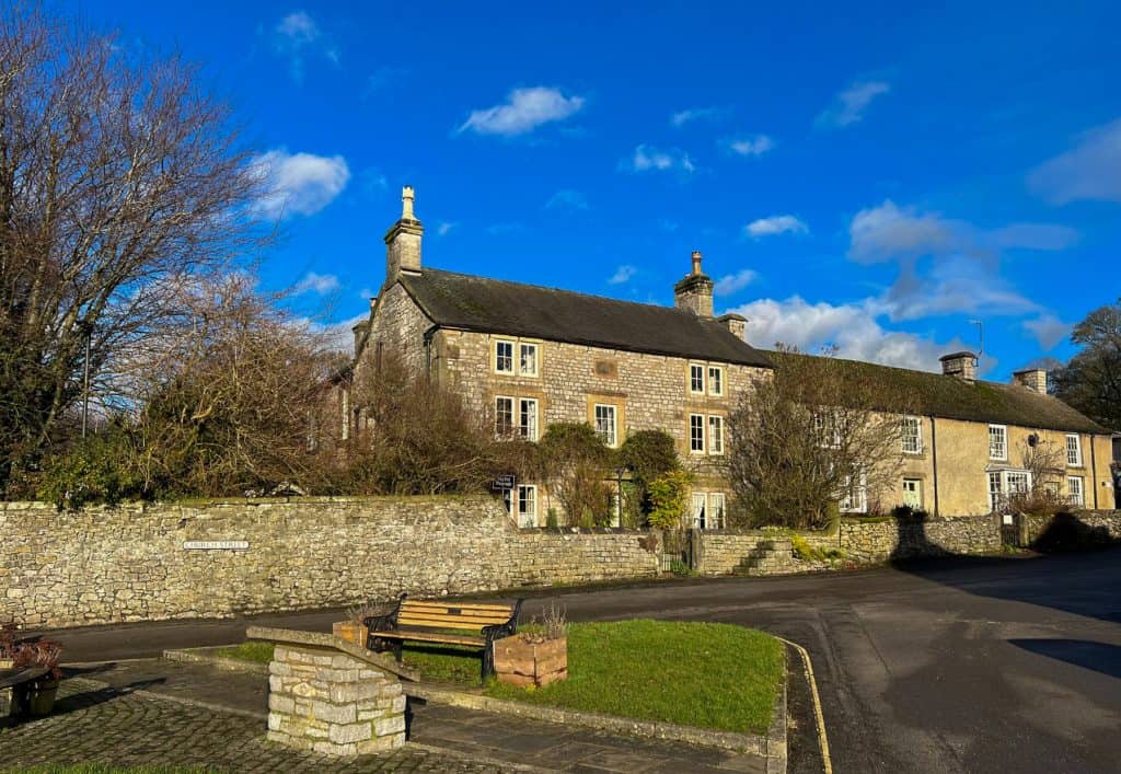 Stone cottages on a sunny day.