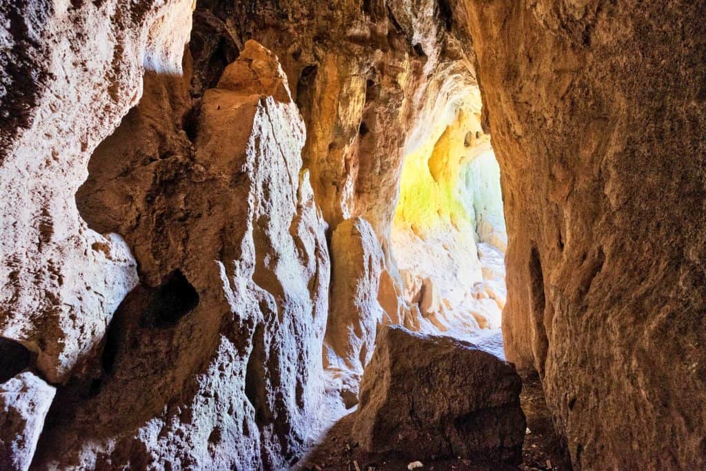 A rock formation with an entrance to the Thor's Cave.