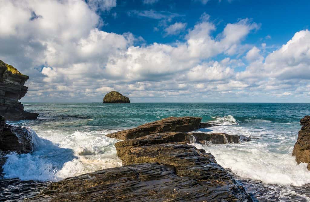 Views from a beach with cliffs.
