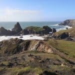 A view from the cliffs at the Kynance Cove beach and rock formation, one of the nice beaches in Cornwall.