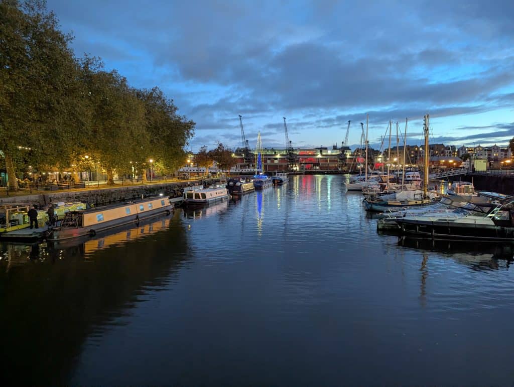 Bristol harbour at dusk with boats.