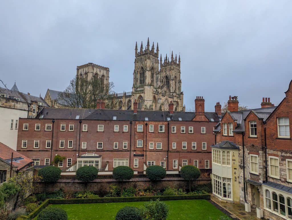 A view at the York Minster Cathedral with buildings from the City Walls.